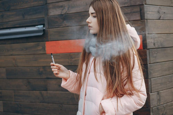 Mulher a vaporizar